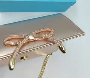 POCHETTE RAME CON FIOCCO STRASS